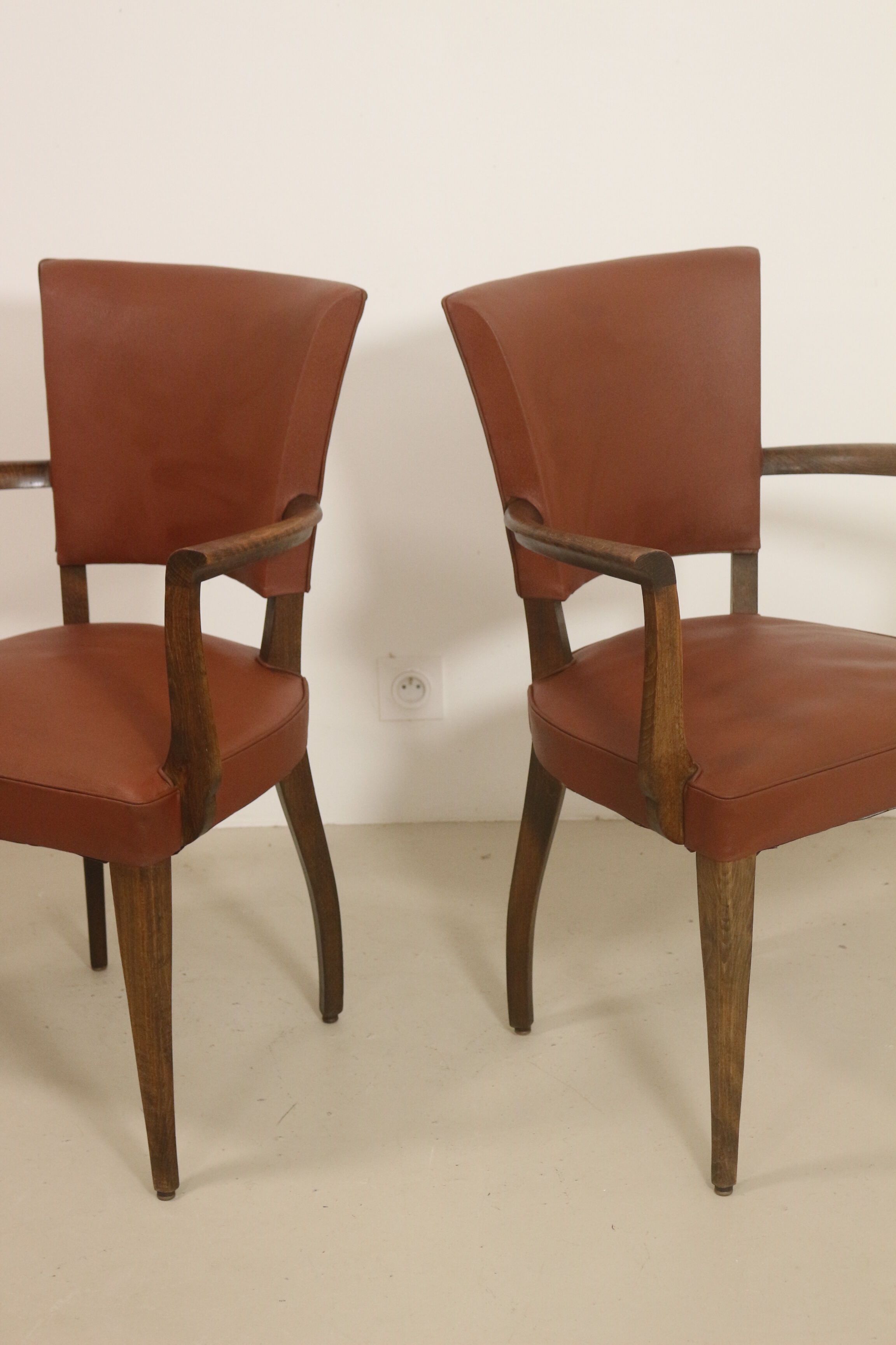 Pair of vintage bridge armchairs year 60 in imitation rust leather.