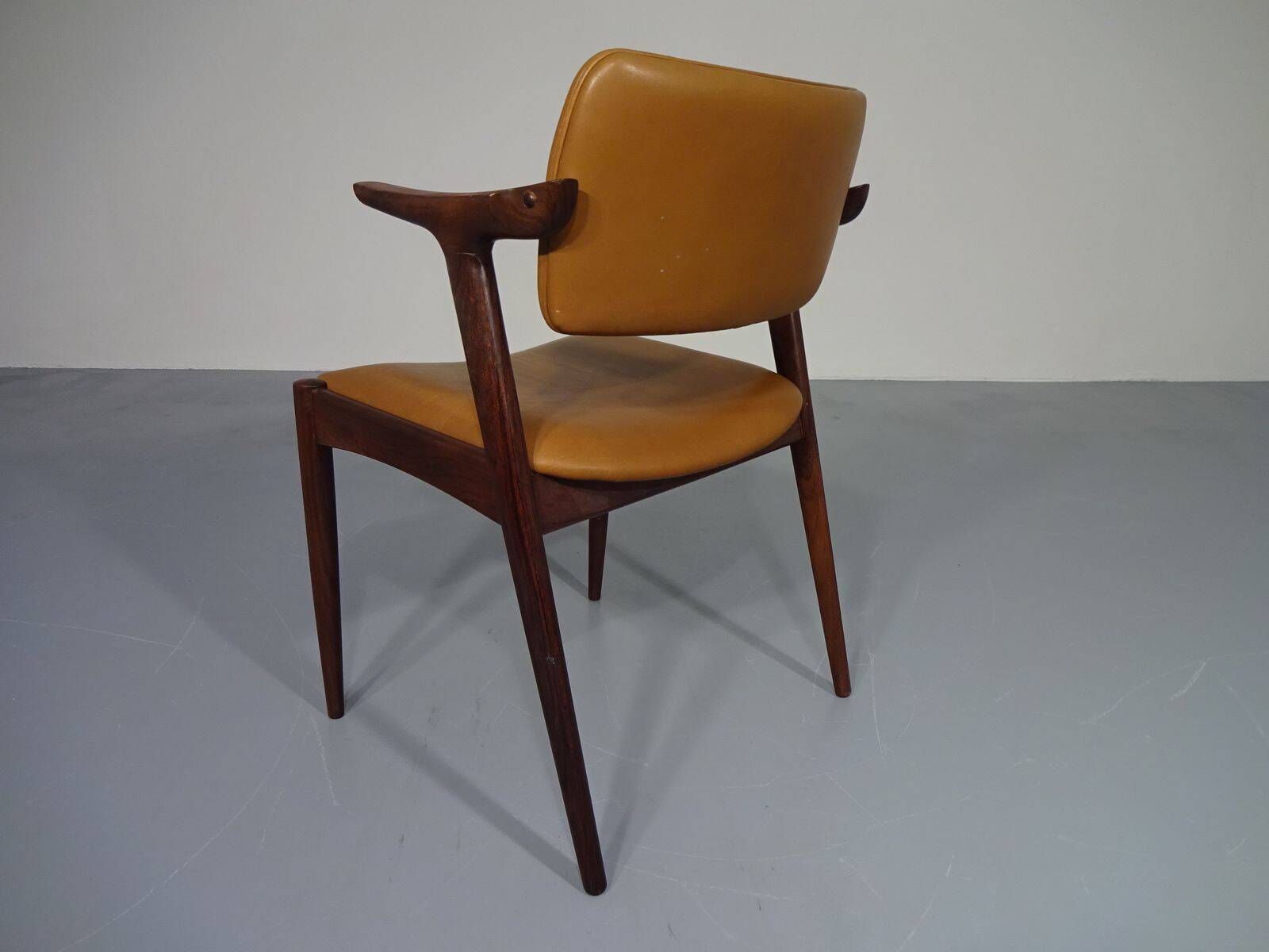 Rosewood and leather armchair from GM, 1960s