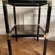 Pair of vintage metal and smoked glass side tables