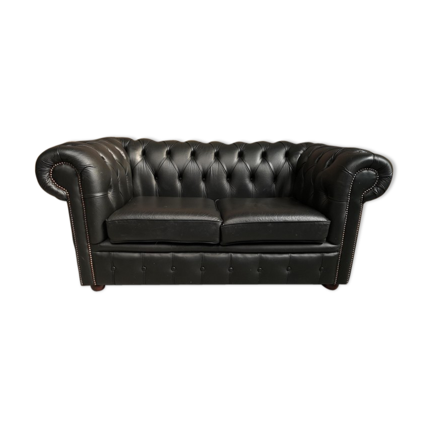 Two seater black leather chesterfield sofa