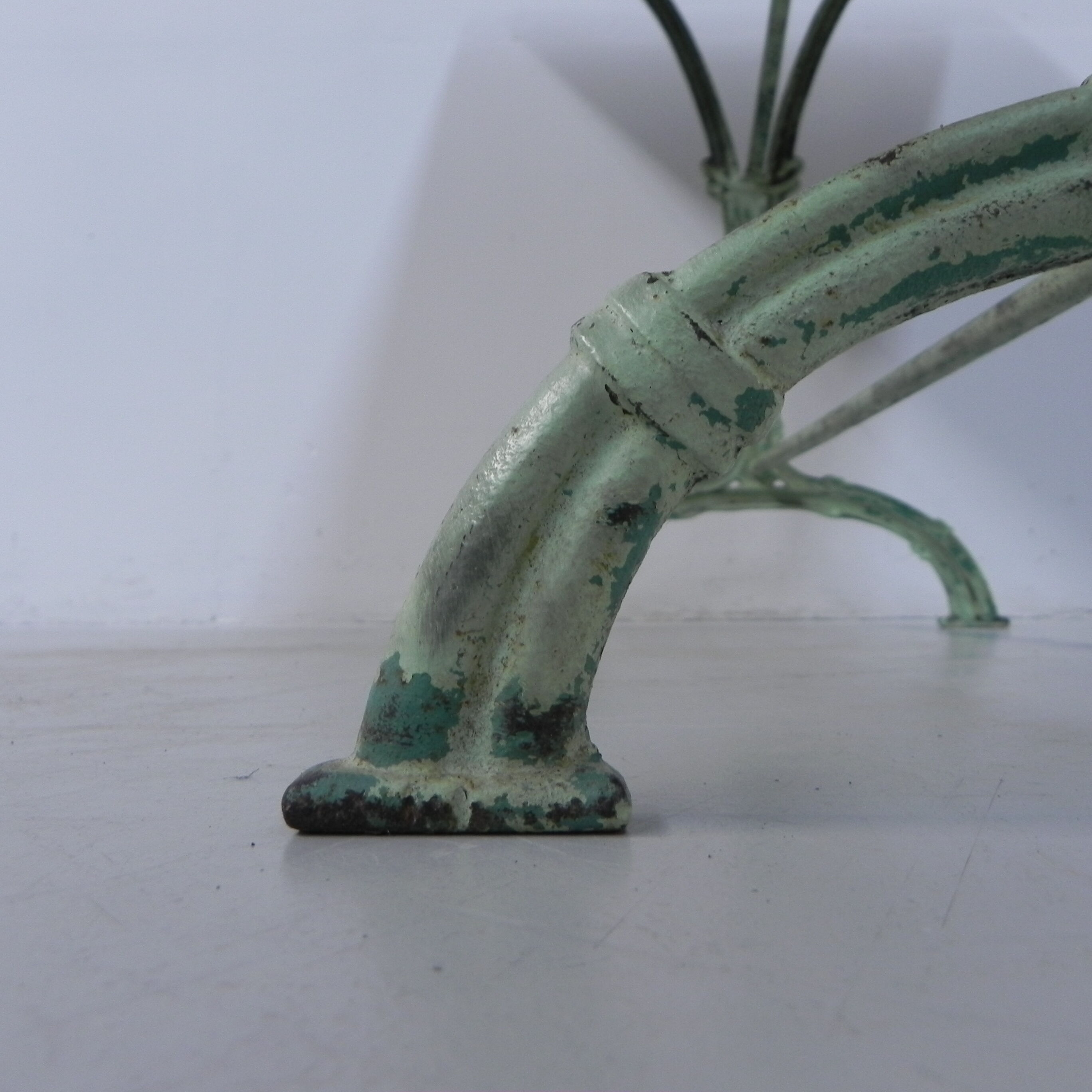 Art nouveau bistro table with cast iron frame