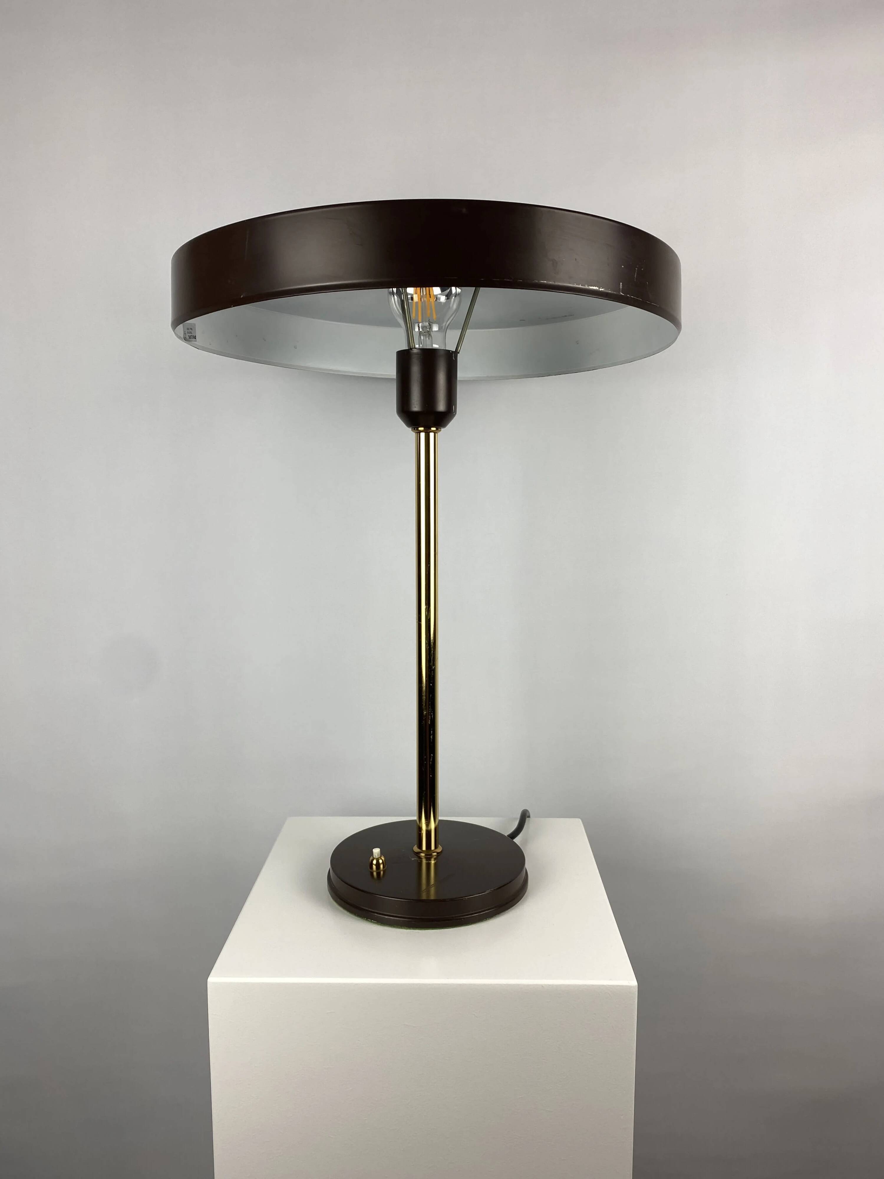 One of the four brown and gold Timor 69 table lamps by Louis Kalff for Philips 1970.