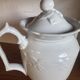 White ceramic teapot