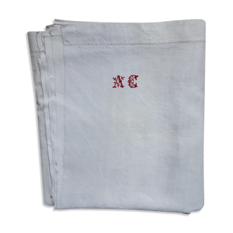 AC monogrammed linen campaign sheet at cross point