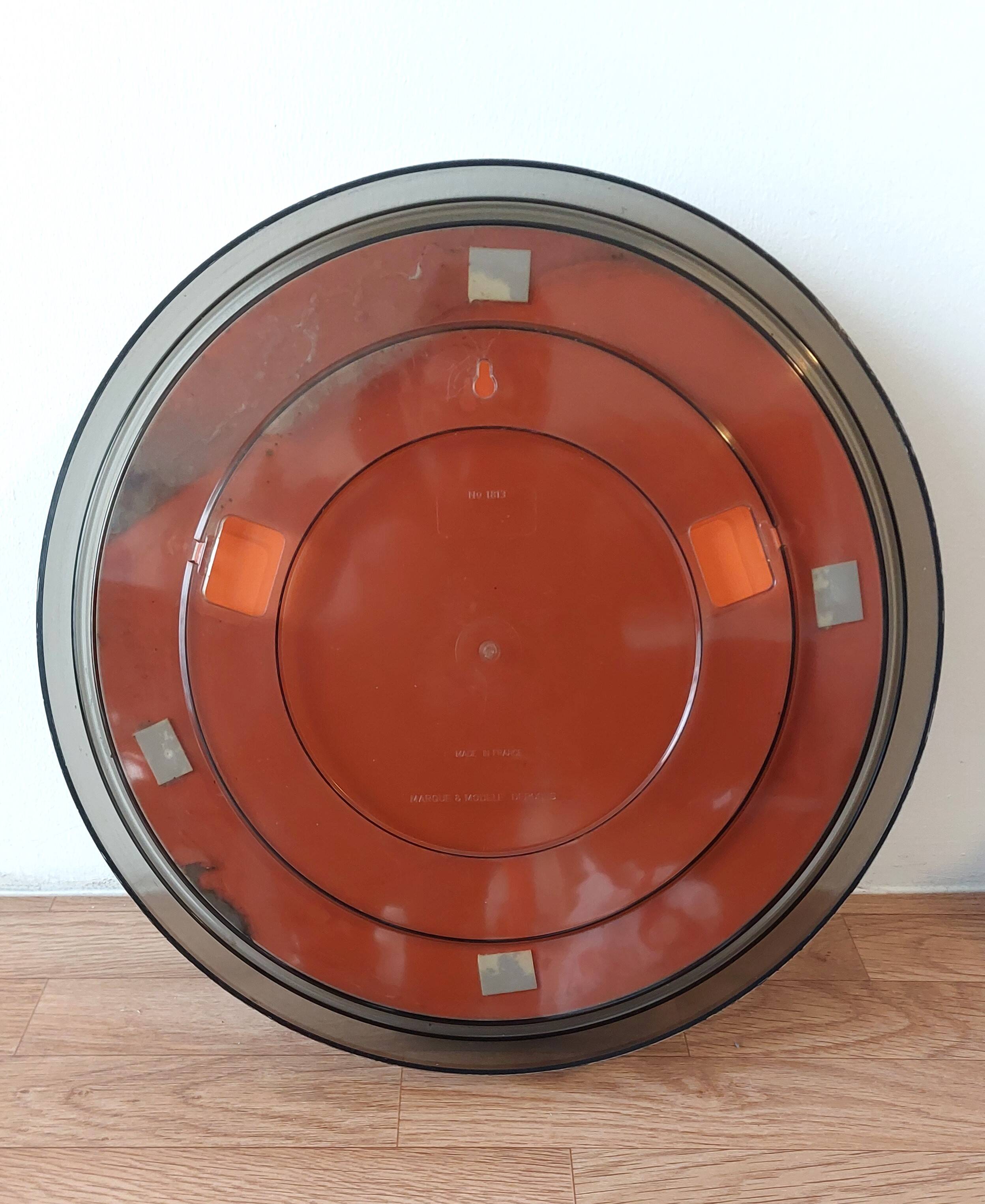 Round smoked plastic mirror 1970 Vintage.