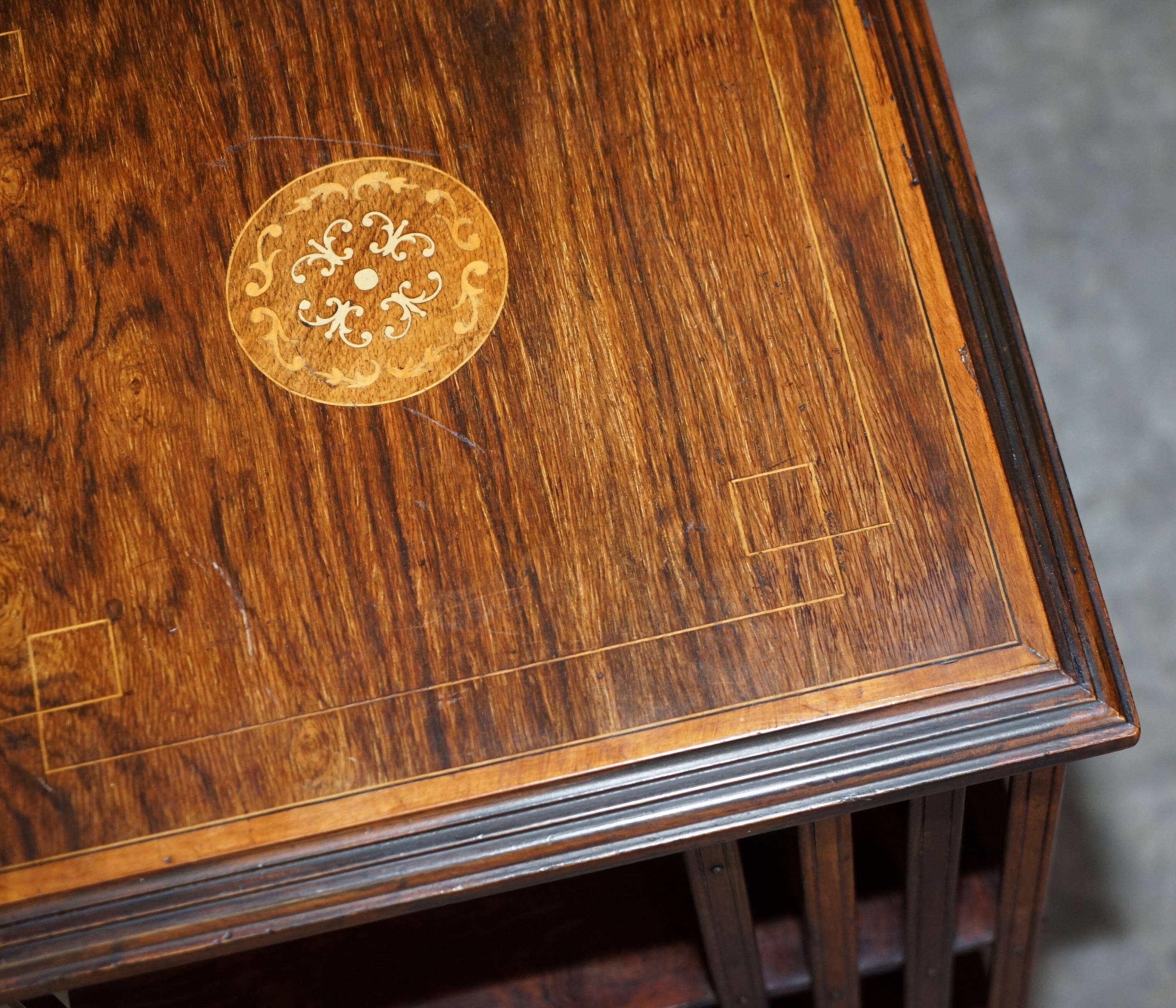 Edwardian revolving bookcase in hardwood with Sheraton inlay.