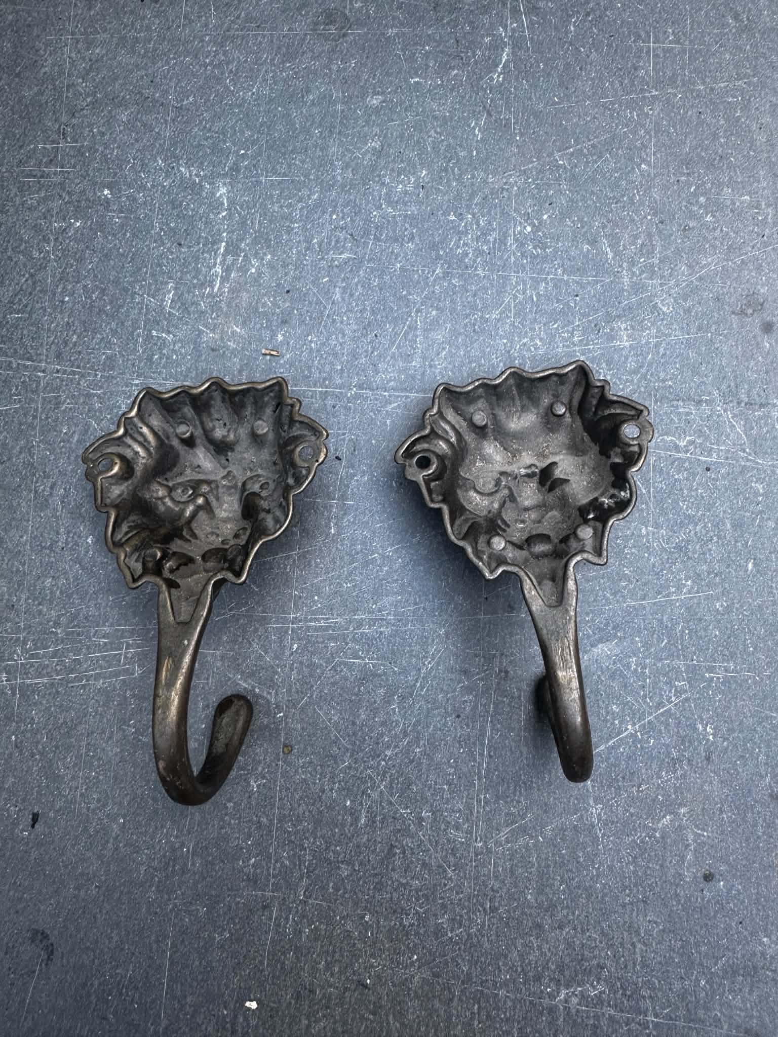2 brass lion coat hooks 19th century