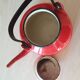 Vintage enamelled sheet metal kettle