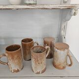 Set of 5 vintage handcrafted stoneware mugs in beige, pink, and white glazed stoneware