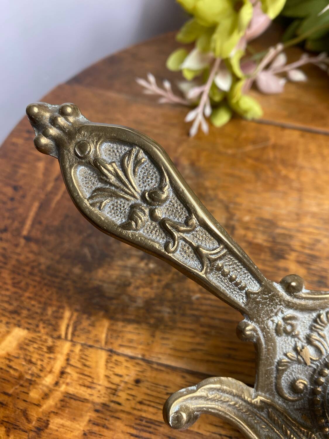 Hand candlestick, peacock shape, in bronze