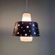 A pair of Scandinavian pendant lights in white opaline and black lacquered metal, 1960.