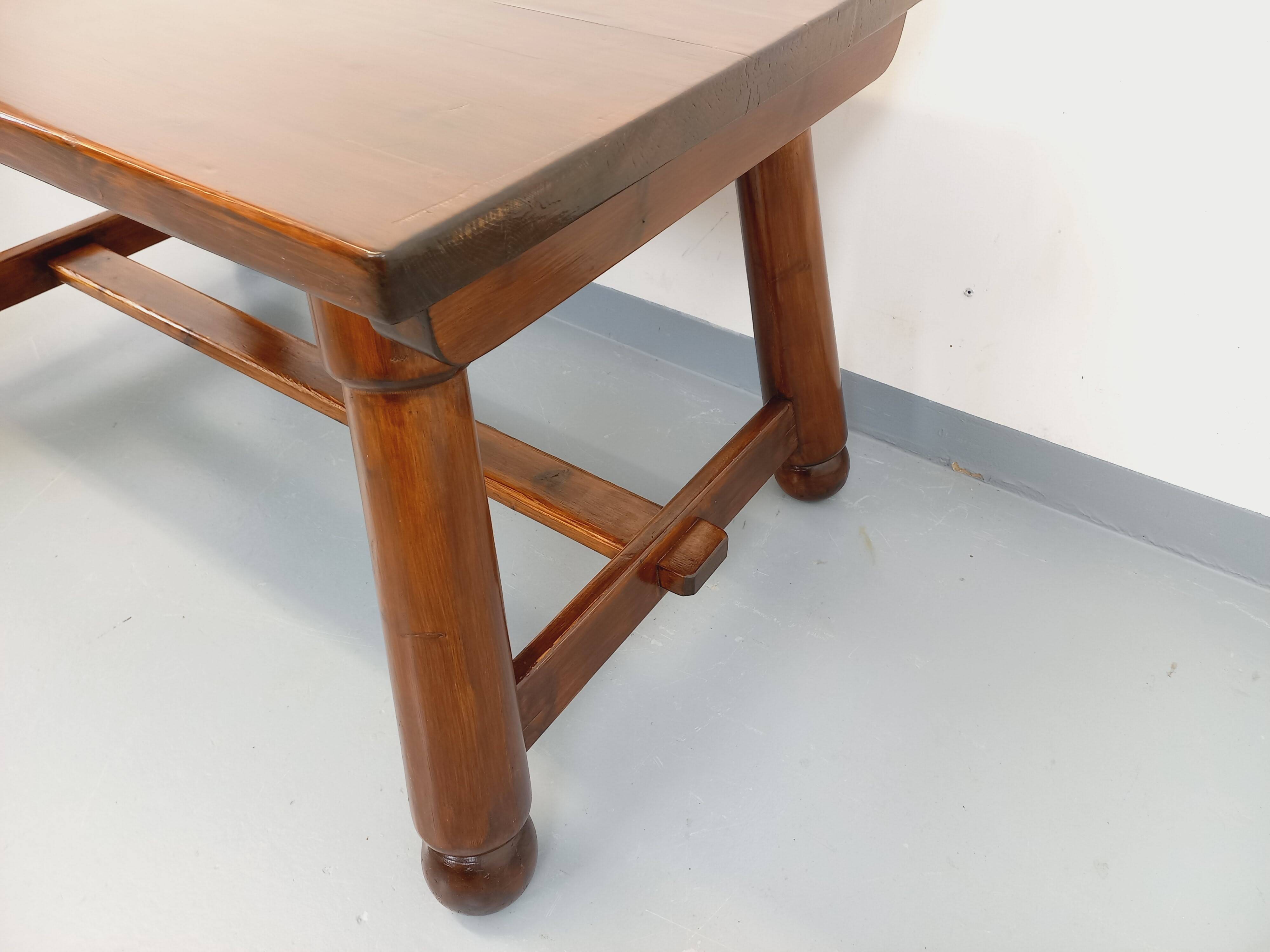 Brutalist rectangular dining table by Georges Robert in pine wood.