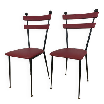 Pair of 1950s chairs in metal and red faux leather, Gueden-Adnet style.