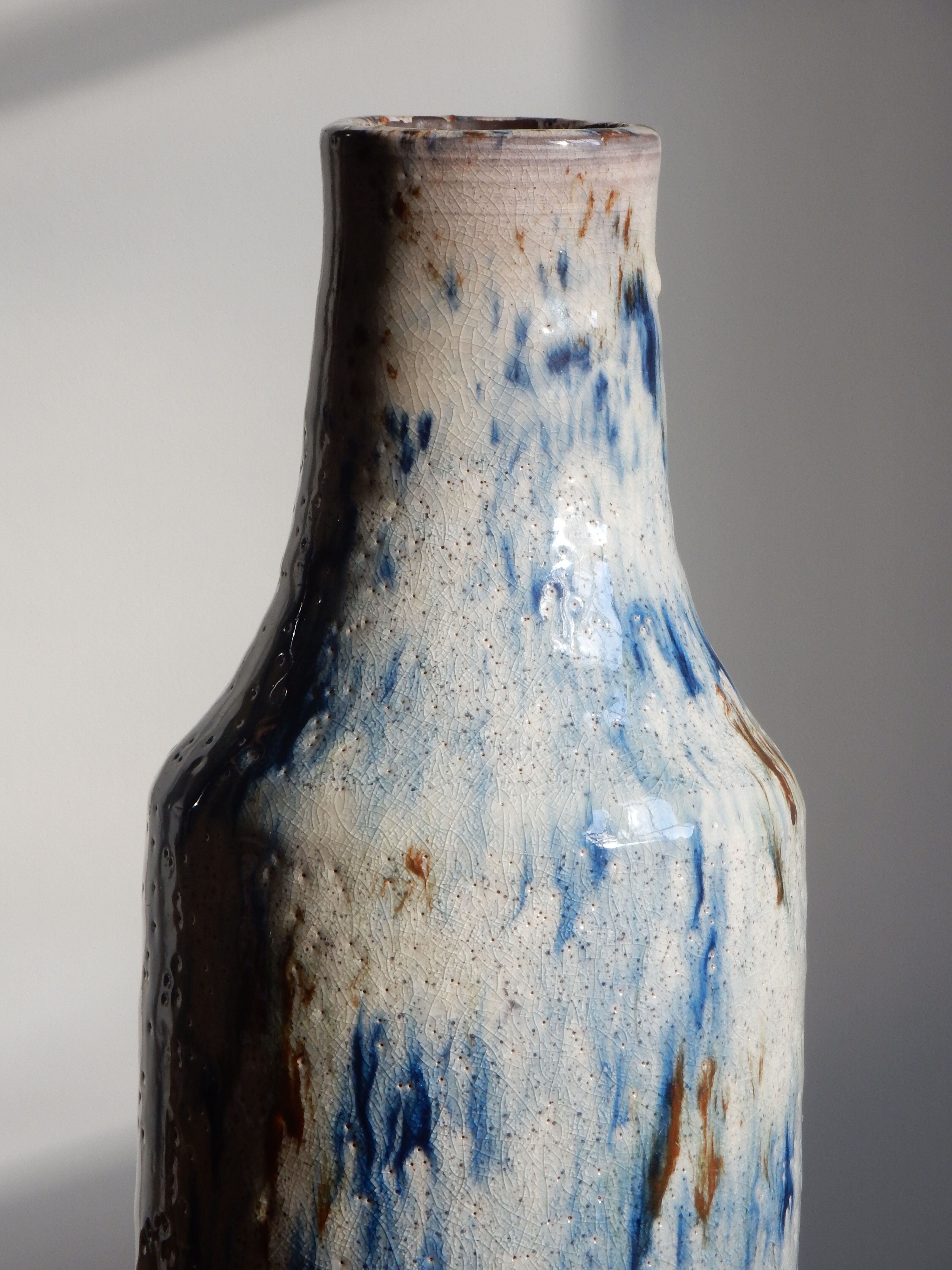 Cracked enamelled sandstone vase