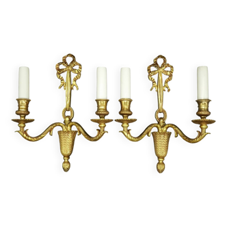 Paire d'appliques au noeud style Louis XVI - bronze
