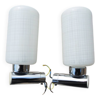 2 old wall lights in chrome and white glass.