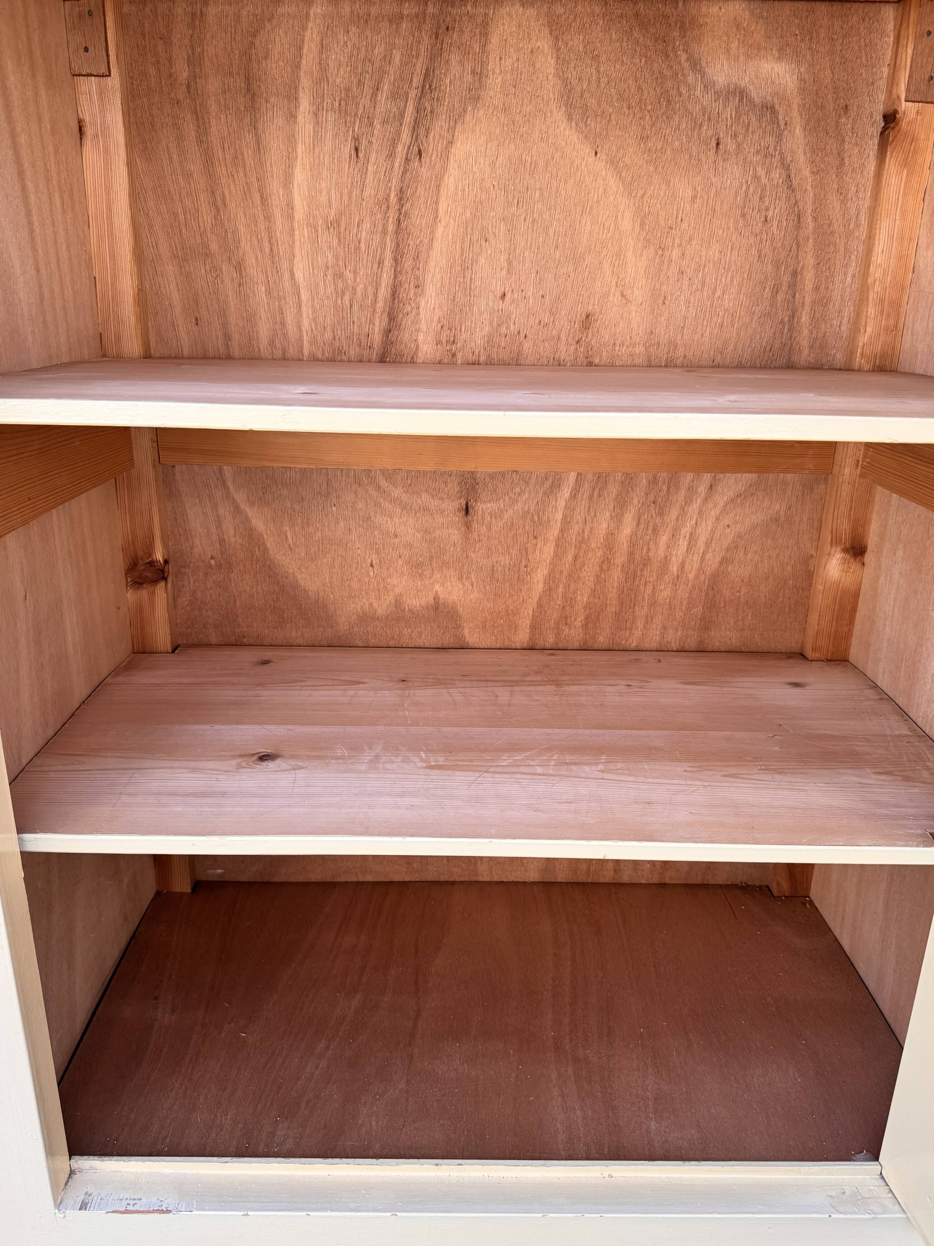 Antique painted wooden bonnet maker