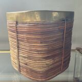 Rattan plant pot rimmed with brass from the 60s and 70s