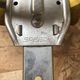 Old pair of speedy metal roller skates grey + straps & vintage brake