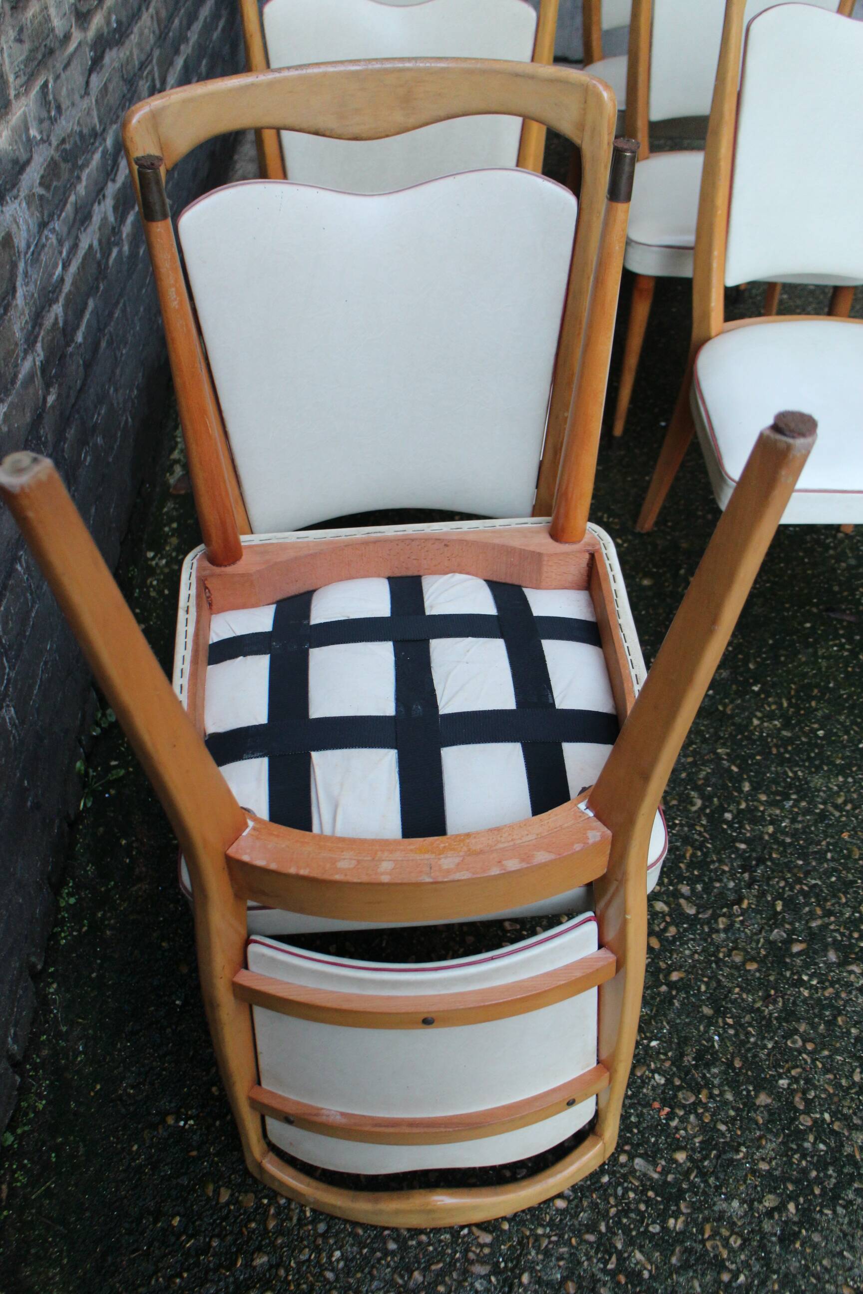 series of 8 vintage skai and wood chairs
