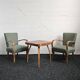 Halabala “Spider” coffee table and Hungarian late Art Deco armchairs, 1950s