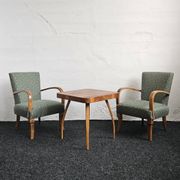 Halabala “Spider” coffee table and Hungarian late Art Deco armchairs, 1950s