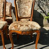 8 cherry wood chairs in Louis XV style with velvet upholstery.
