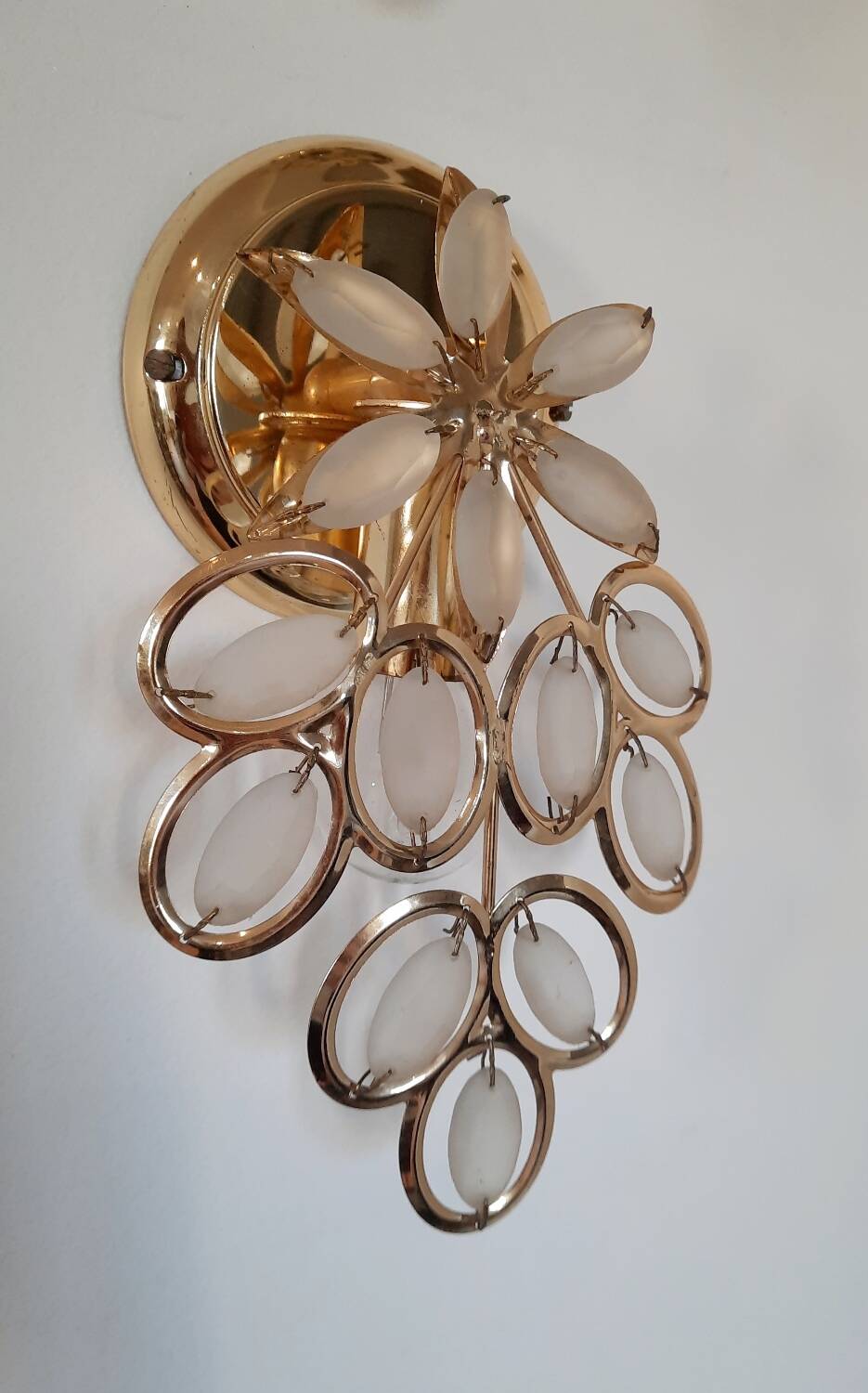 Golden tassel wall light