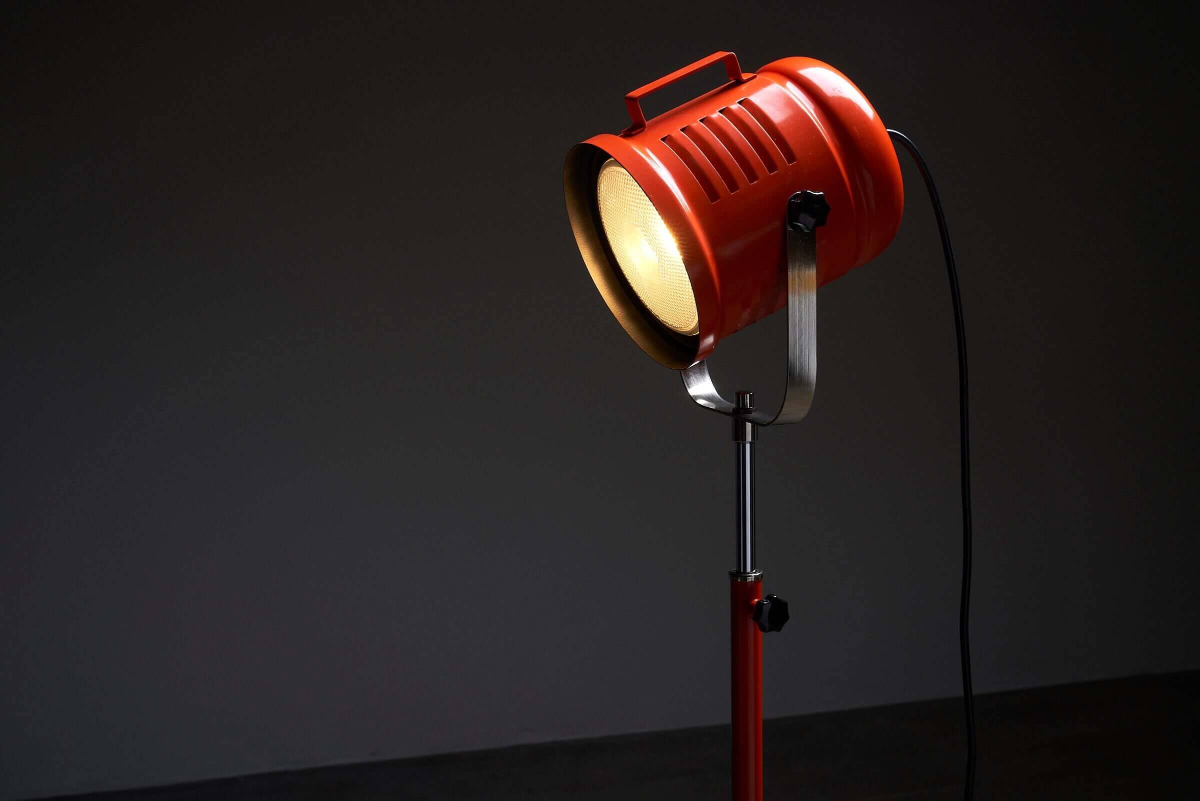 Bright orange spot floor lamp by Aneta