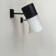 Pair of vintage adjustable wall lights, matte black metal and opaline glass, France 1950