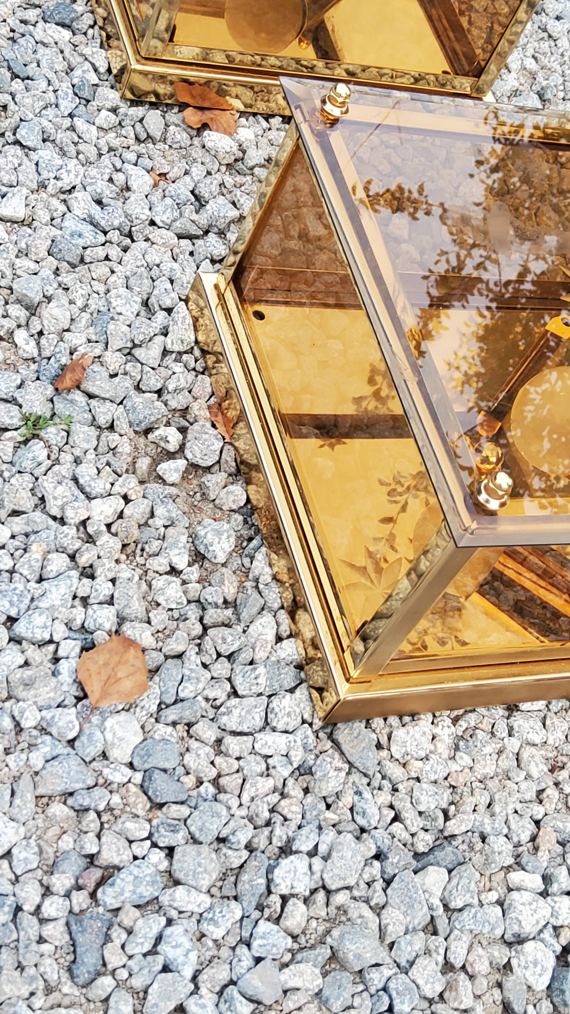 Pair of wall lamps in smoked glass and gilded metal from the 70s/80s