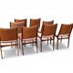 8 chaises scandinaves années 1960 de johannes andersen en palissandre massi