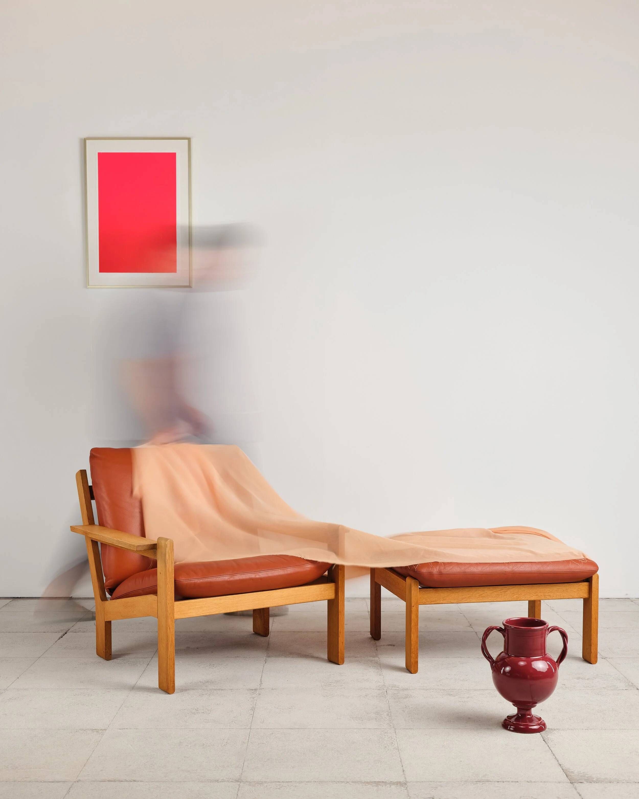 Brutalist armchair and ottoman by Tage Poulsen, Denmark, 1970s.