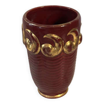 Mid-century relief vase in ruby red enhanced with gilding.
