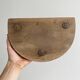 Antique wooden tripod stool with turned legs