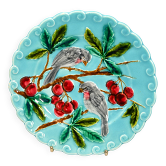 Assiette barbotine bleue Sarreguemines décor aux oiseaux