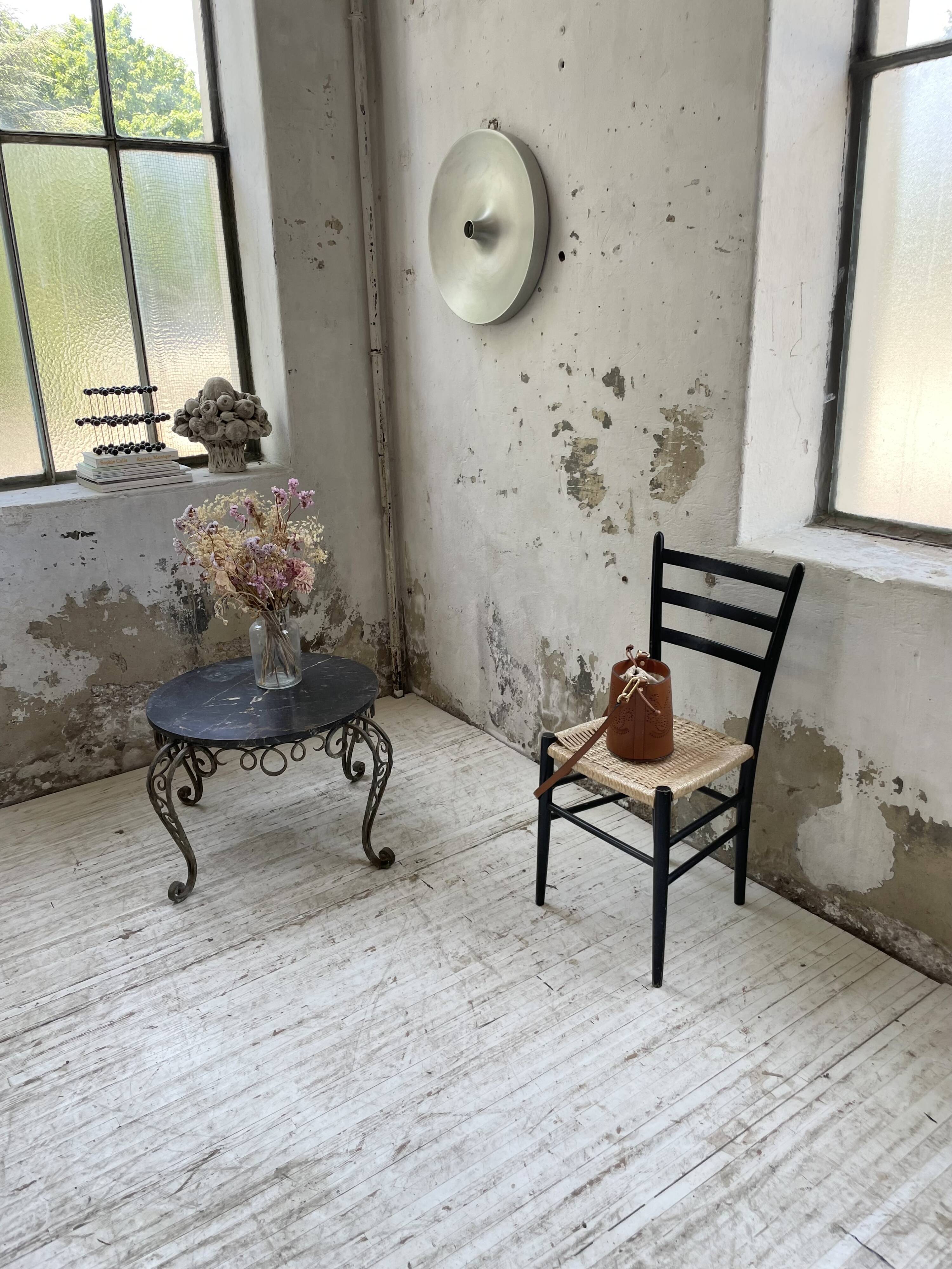 René Drouet coffee table in metal and black marble.