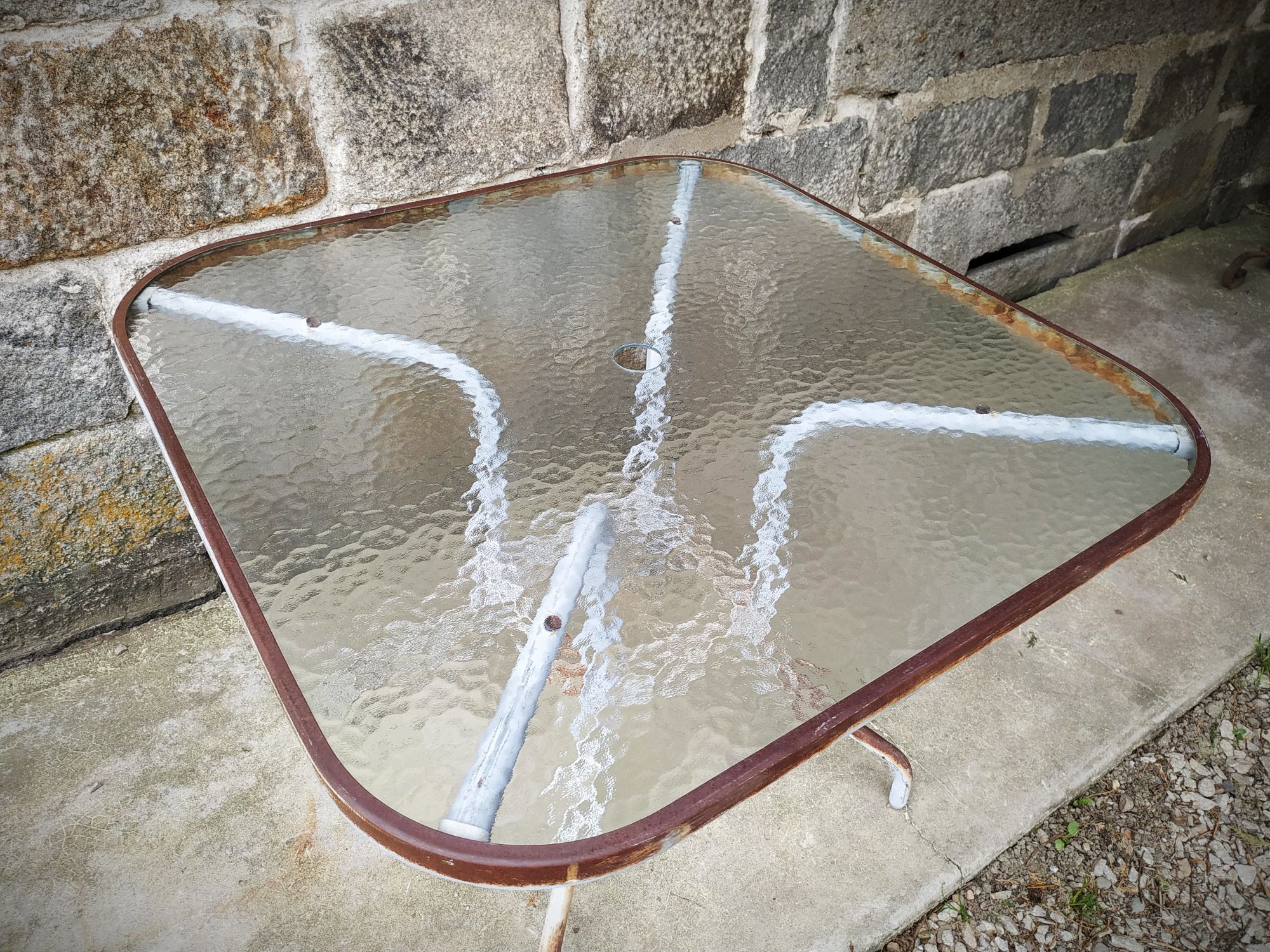 Old garden pedestal table