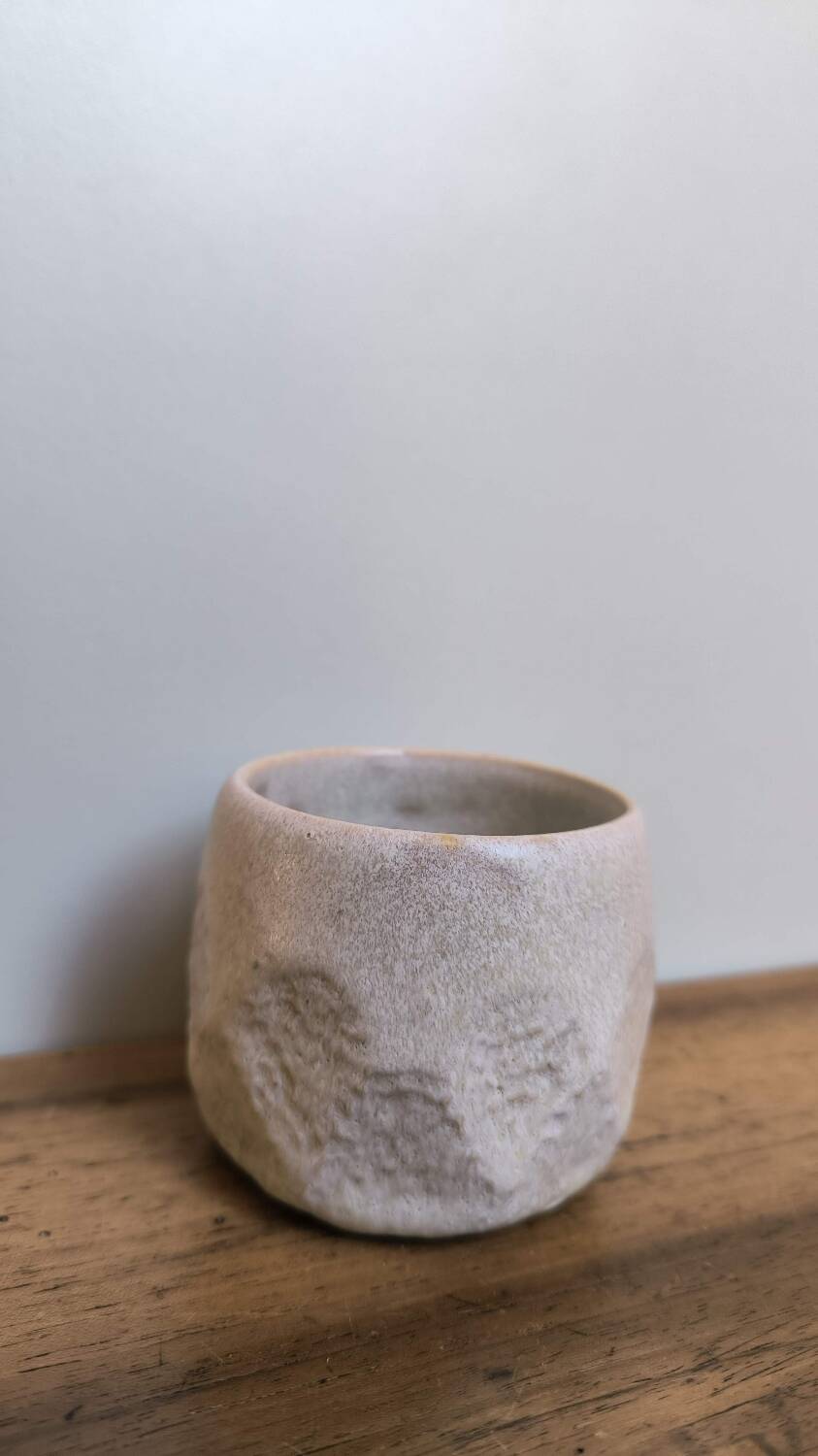 Faceted ceramic cup, handcrafted stoneware, turned, pale yellow enamel