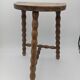 Tabouret tripode bois pieds perlés