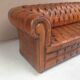 Upholstered chesterfield brown sofa