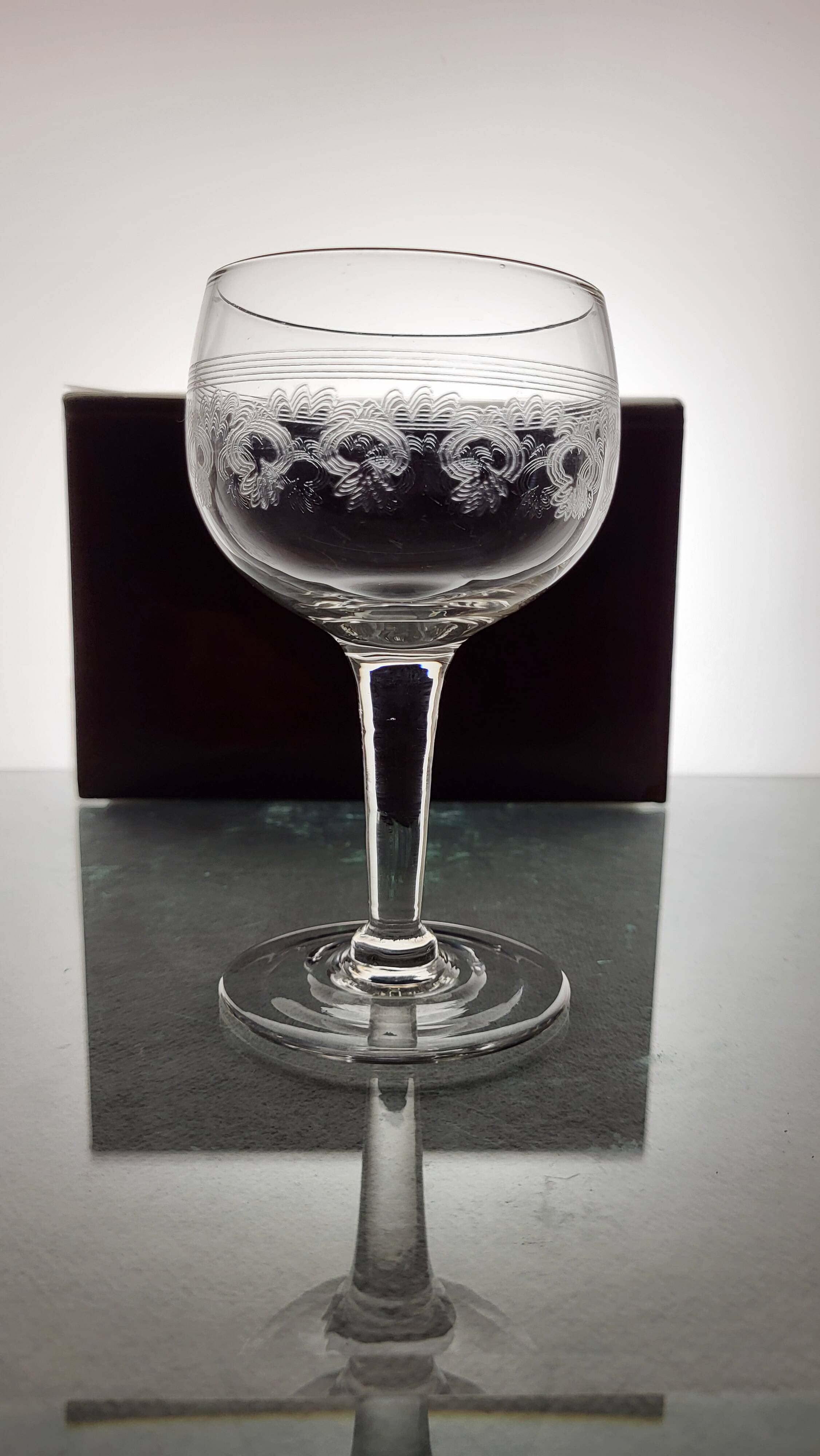 9 guilloche wine glasses, early 20th century