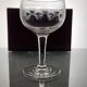 9 guilloche wine glasses, early 20th century