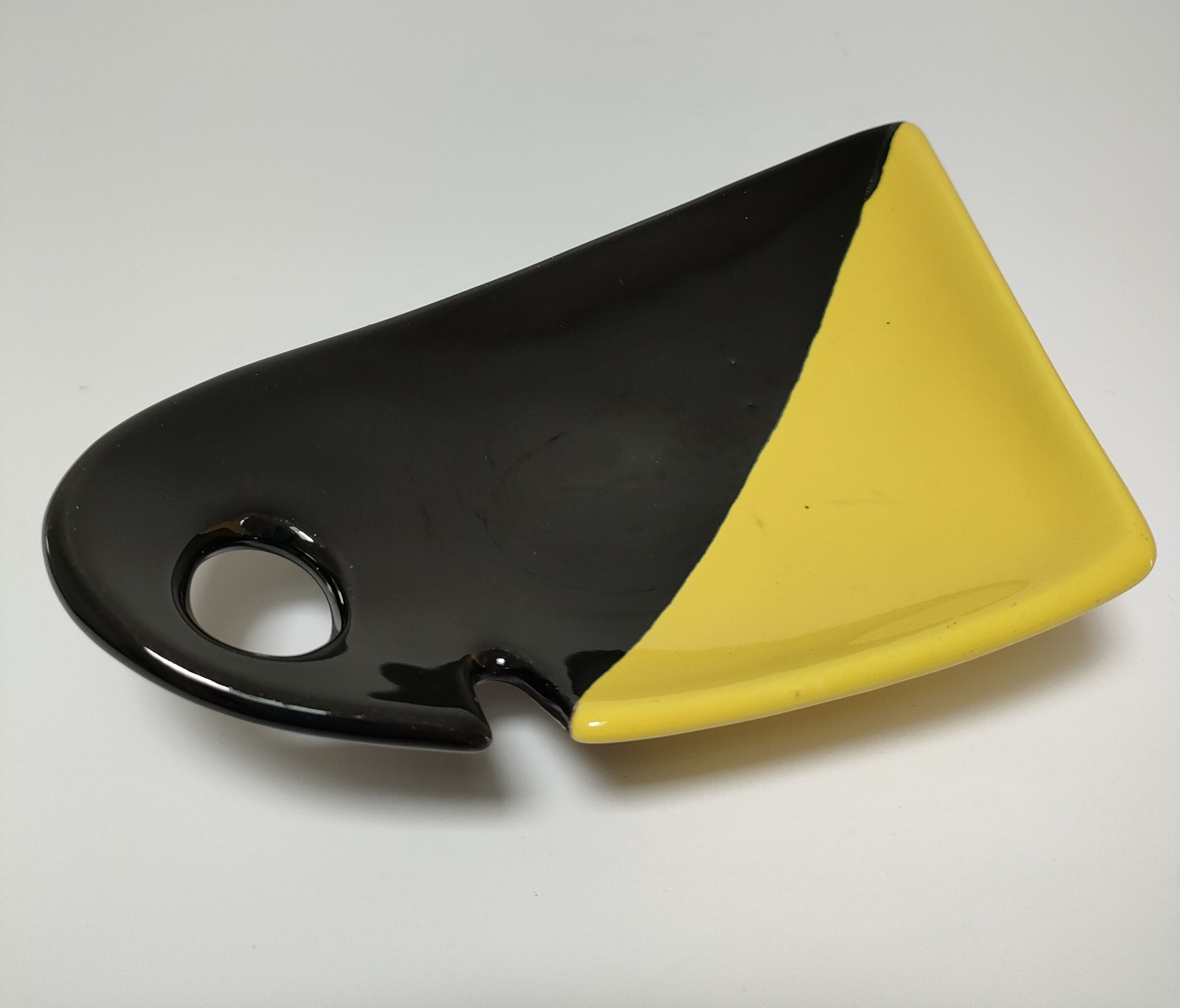 Empty pocket anthropomorphic ceramic black and yellow design 50s