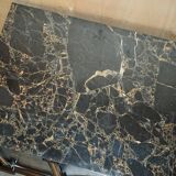 Contemporary Chinese buffet with a marble top and space for a mini-fridge.