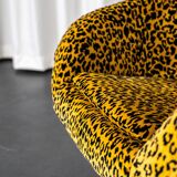 Vintage swivel shell armchair