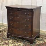 1950s English mahogany chest of drawers with one shelf