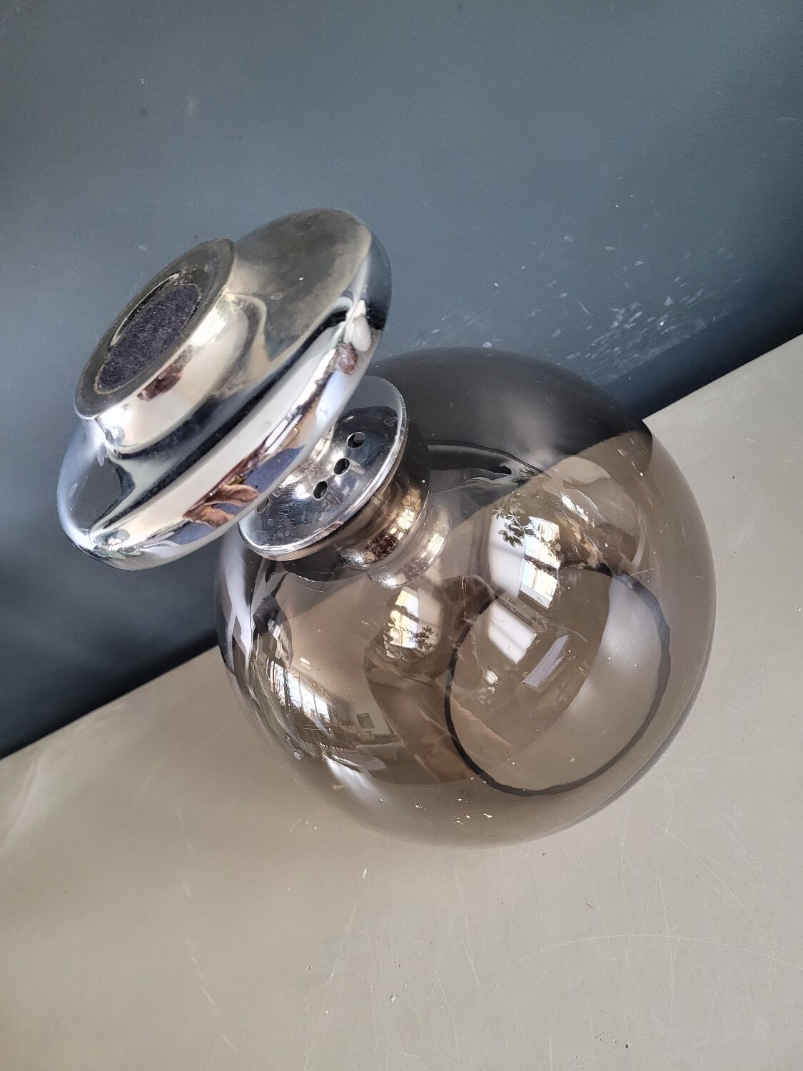 Outdoor glass candle holder in smoked glass and chrome
