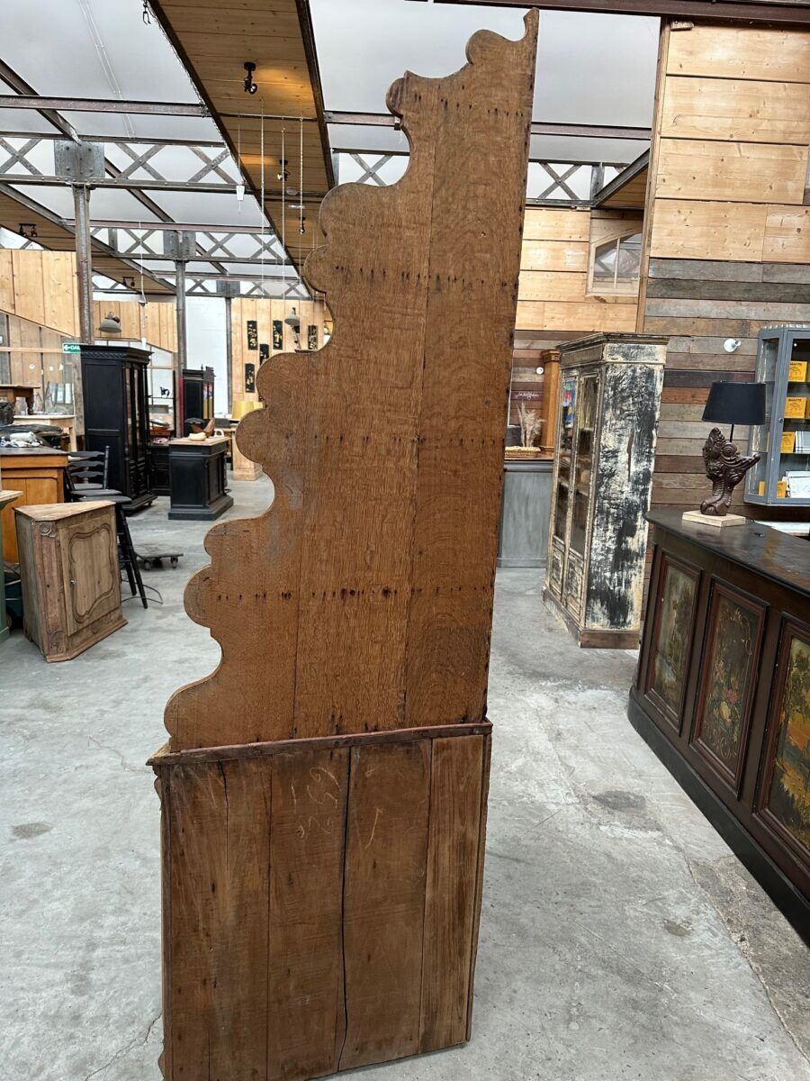 Corner cabinet in oak, late 19th century.