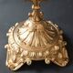 Antique three-light openwork brass church candelabrum.